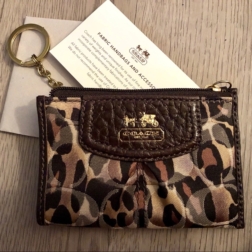 New with tag , Coach key chain with change purse.